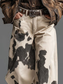 Pantalones de patrón de vaca estilo occidental retro y a la moda
