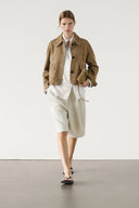 Veste en cuir suédé fendue avec poche