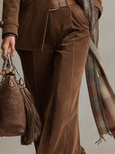 Pantalones acampanados marrones retro versátiles de ante sintético con borlas