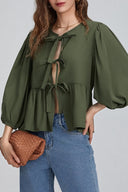 Haut blouse à manches bouffantes, basque et nœuds papillon