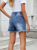 Zomerse asymmetrische denimshorts met franjes