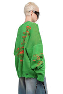 סוודר רלקס עם קרעים בצבעים משתלבים