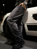 Schwarze Flared Jeans mit Kristallbesatz