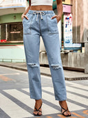 Herbstliche Jeanshose mit Kordelzug und Used-Look