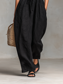 Løs pasform hørblandet strapless jumpsuit med bindebånd