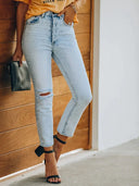 Pantaloni vintage in denim strappato alla caviglia
