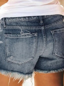 High-waist denim shorts met franjes en scheuren