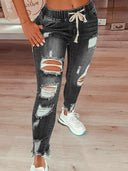 Jeanshose im Used-Look mit Kordelzug und lockerem Schnitt im Streetstyle