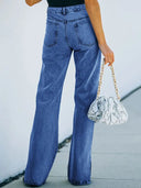 Pantaloni in denim lavato con spacco all'orlo