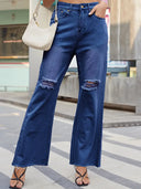 Jeans vintage a gamba larga strappati a zampa