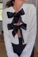 Veste à paillettes nouée devant