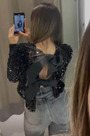 Veste à paillettes nouée devant