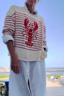 Pull graphique homard à rayures crème et rouge
