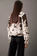Veste style chemise en fausse fourrure imprimé vache