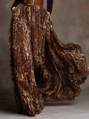 Conjunto elegante de blusa de terciopelo con cuello alto y falda larga con estampado de leopardo con cinturón