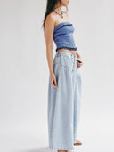 Blugi cu nasturi și pliuri frontale
