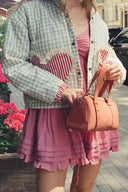 Veste à poche cœur rose à carreaux