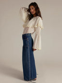Jeans mit verstellbarem Saum und Drapierung