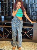Trendy oversized overal s kapsami