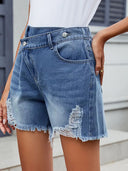 Zomerse asymmetrische denimshorts met franjes