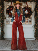 Salopette rossa in finta pelle scamosciata stile western retrò con scollo a V, zip, gamba larga e nappine