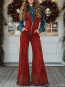 Salopette rossa in finta pelle scamosciata stile western retrò con scollo a V, zip, gamba larga e nappine