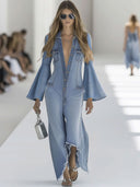 Casual retro lyseblå denim jumpsuit med vidde, lange ærmer og rå kanter
