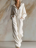 Tuta casual larga alla moda in velluto a coste bianco con cappuccio, zip frontale e maniche lunghe
