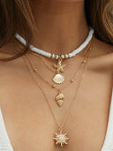 Collana a più strati con stella marina conchiglia del Pacifico del Sud oro