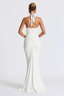 Abito lungo sirena con scollo a V profondo e spalline halter