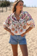 Camisa bege oversized com botões