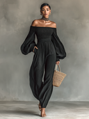 Dame off-shoulder jumpsuit med lange ærmer og plisseret stof