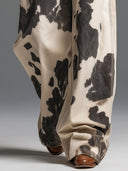 Pantalones de patrón de vaca estilo occidental retro y a la moda