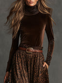 Conjunto vintage de blusa de terciopelo con cuello alto y falda con estampado de leopardo