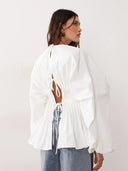 Blusa peplum com pregas e costas abertas