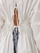 Blusa peplum com pregas e costas abertas