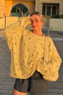 Pull long en maille à motifs floraux et col rond