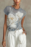 Blusa azul de chiffon com estampa floral